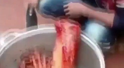 Cooking human flesh in Africa... !