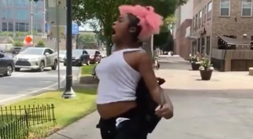 Spastic black woman lost it...