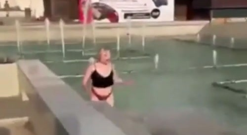 Blonde at the fountain