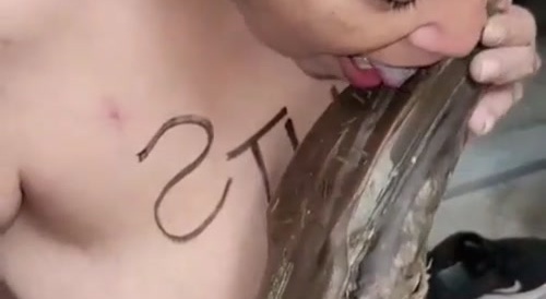 crazy woman licking a boot