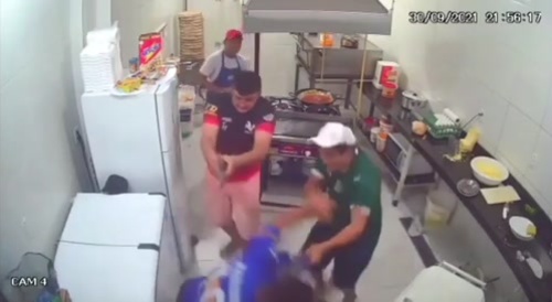 man hits thief in the head with rolling pin