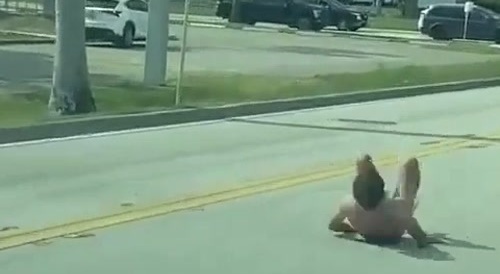 Florida, of course. Naked guy does somersaults down the road.