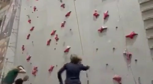 Man free soloes on climbing wall & falls...!