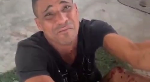 Gang rival member hung up by feet gets hands smashed with hammer... !