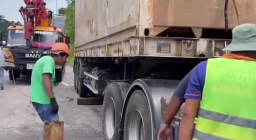 Roadside assistance for a truck in Thailand...