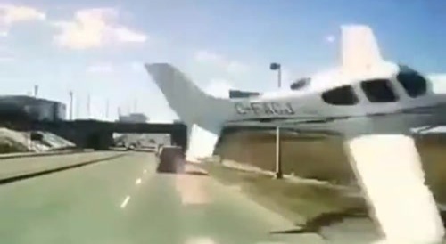 A car with a very close encounter with an airplane... !