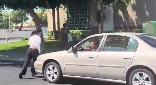 Angry Woman Smashes Man's Windshield
