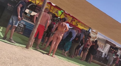 She is walking naked in public festival