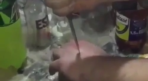 Russians Make Dude Stab Himself In The Hand