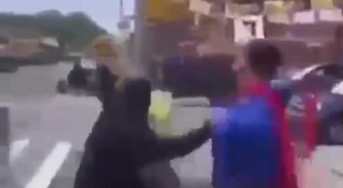 Angry Man Beats Superman And Batman In Public