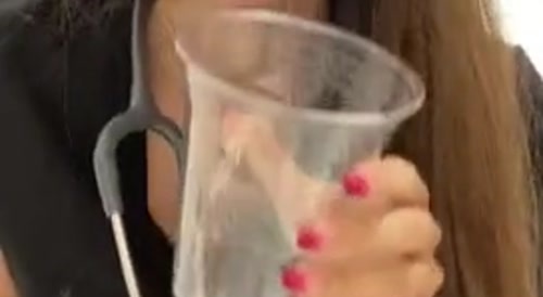 Woman drinking her piss... !