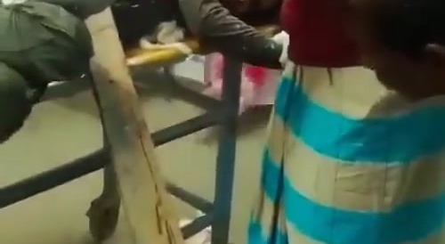 A man's belly & back impaled with a wooden board... !