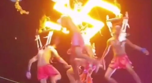 East Indians hung by their backs, spinning around on burning swastika... !