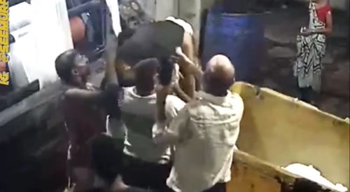 Guy in Factory gets stuck,