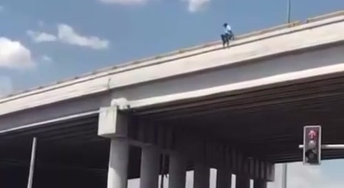 Man critically injured after jumping from an overpass...
