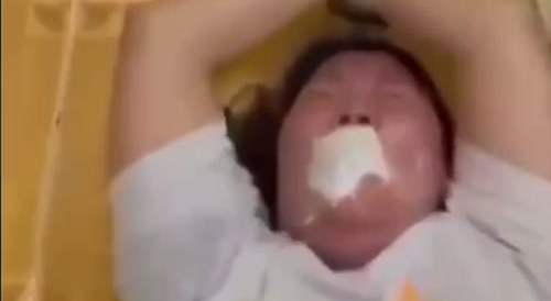 Tied-up woman has her finger hewn & is tased... !