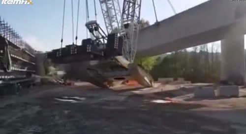 Behemoth crawler crane falls with load and everything... !