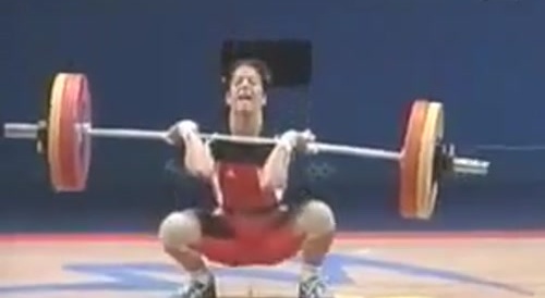 woman poops when using too much force while holding weight