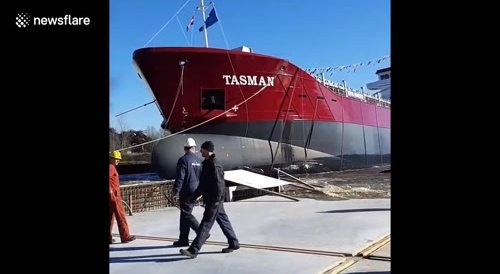 Man almost dragged along and/or crushed during launching of mega ship... !