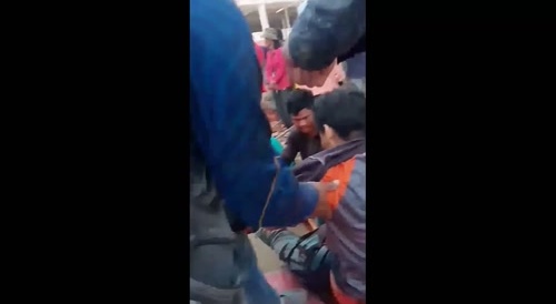 A man's groin & back impaled with a bamboo pole... !