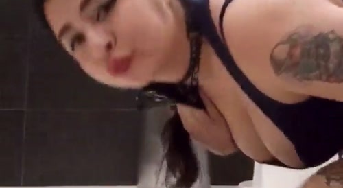 Woman pisses on floor in public venue