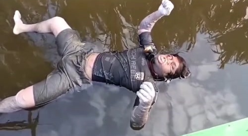 Dead body in the water in Indonesia...