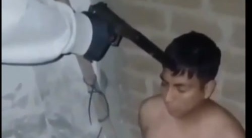 Dude executed with shot to the head and Desmembered