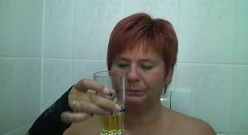 woman pees and drinks her own urine