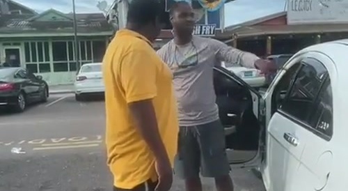 2 black men fight : 1 knock-out, the other drives off...