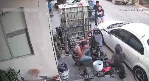 Man and woman open fire on 2 mechanics...