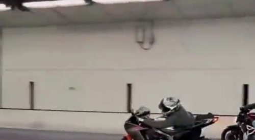 Wheelie stunter gets back in control in time...