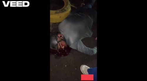 Man & woman on motorbike go nowhere in Venezuela...