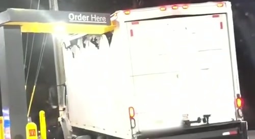 Box truck tears due to drive thru overhang
