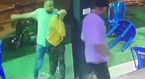 A man is beaten at a café...