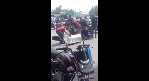 Collision between truck and motorcyclist...