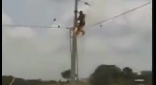 Lineman in Colombia is zapped on and off...