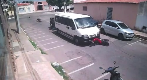 Van Driver Runs Over Motorcyclist In Alleged Act Of Self-Defense Dragging The Bikers Body Near The Gates Of A School.