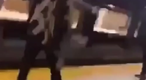 Black nincompoop comes too close to the train... !
