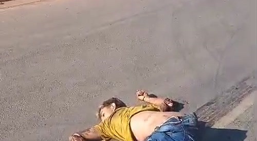 Man on motorbike taken by truck...