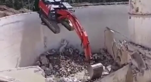 Excavator wants to come down his way...
