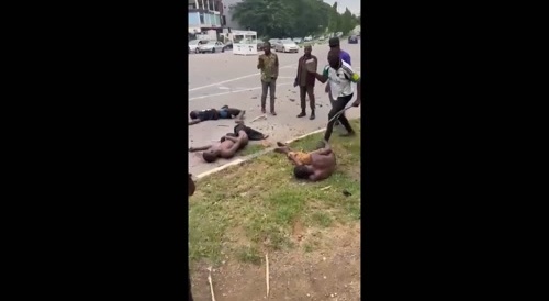 Criminals are flogged by passers-by...