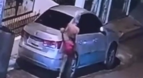 Woman trying to steal car is shot by owner...