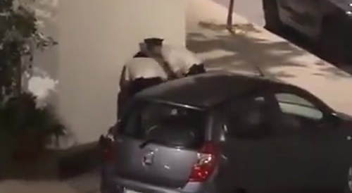 Two corrupt police chiefs are beating the shit out of an innocent man