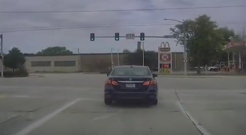 Car almost gets t-boned at intersection