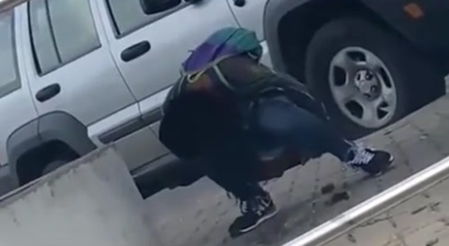 woman defecating in front of everyone