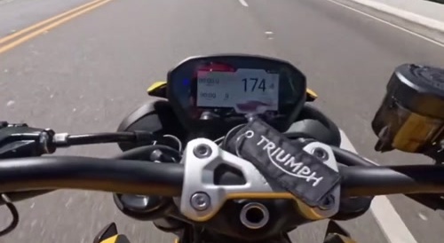 Motorcyclist almost crashes
