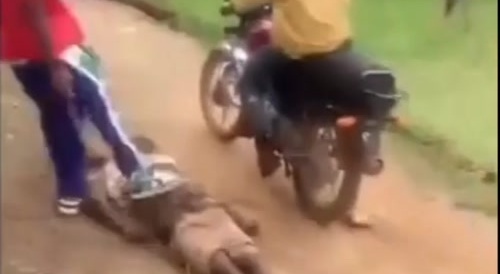 Thief beaten & they torture him with bike