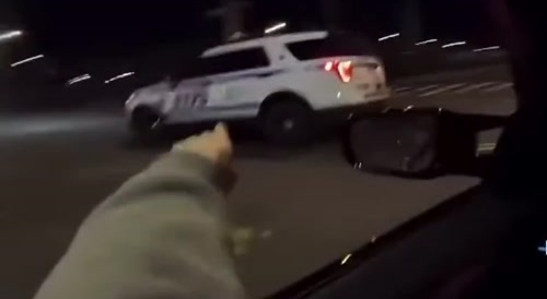 Car drifts around Police SUV