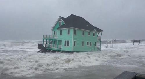 homes collapsed into the ocean