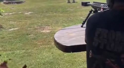 Someone almost getting seriously injured at shooting range.